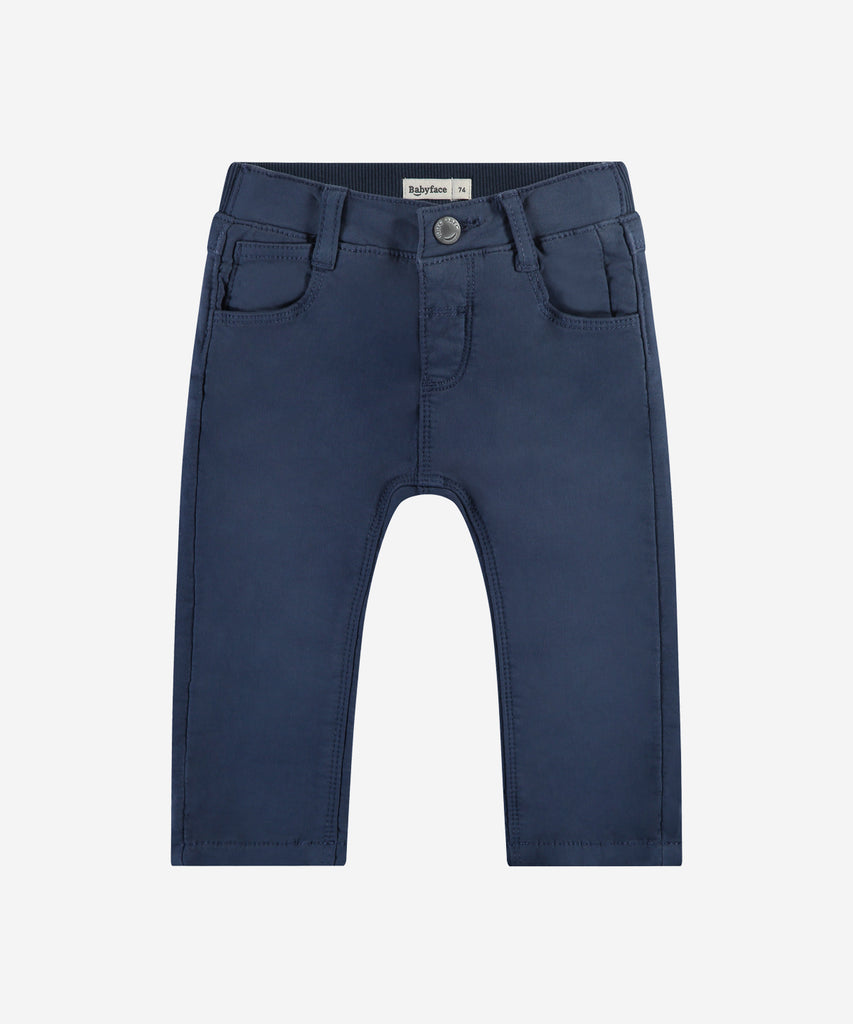 Details:&nbsp;These dark blue baby soft canvas pants are a must-have for any little one. With functional pockets, sturdy belt loops, and a secure button and zip closure, these pants offer both comfort and convenience. Made from soft canvas material, your baby will stay cozy all day long.&nbsp; Color:&nbsp;Dark blue&nbsp;&nbsp; Composition: 98% cotton/2% elasthan &nbsp;