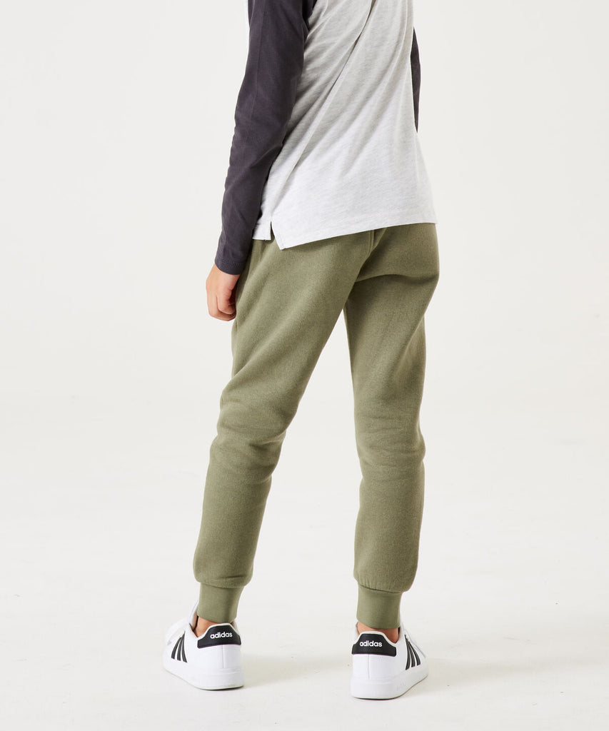 Details: Featuring a sleek, beetle green design, our Jogg Pants provide a comfortable and stylish option for your active lifestyle. Made with an elastic waistband&nbsp; and leg cuffs, these jogging pants offer a snug fit while allowing for ease of movement. Perfect for any workout or casual outing, these pants are a must-have for any wardrobe.&nbsp; Color: Beetle green&nbsp;&nbsp; Composition:&nbsp; 80% Cotton, 20% Polyester &nbsp;