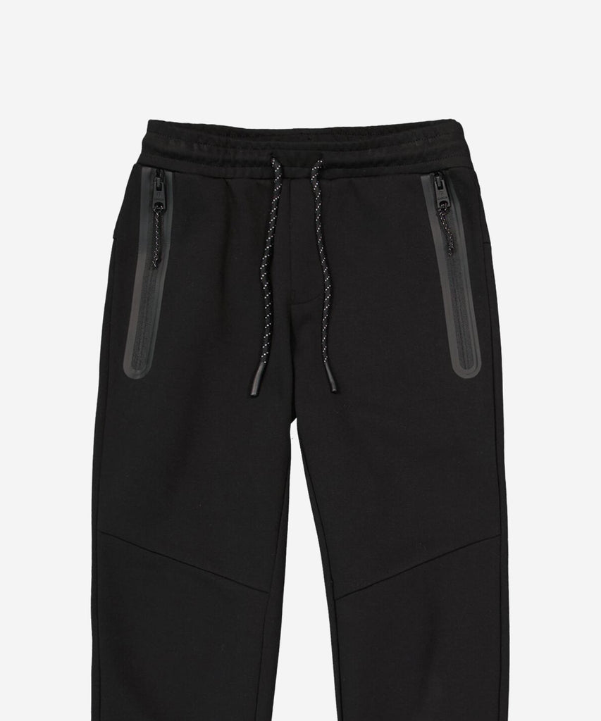 Details:&nbsp; Introducing our Jogg Pants with Zip Pockets in Off Black. These stylish and versatile pants feature convenient zip pockets and an elastic waistband for maximum comfort and practicality. Perfect for any casual or athletic occasion.&nbsp;
Color: Black&nbsp;
Composition:&nbsp; 70% Cotton, 30% Polyester &nbsp;