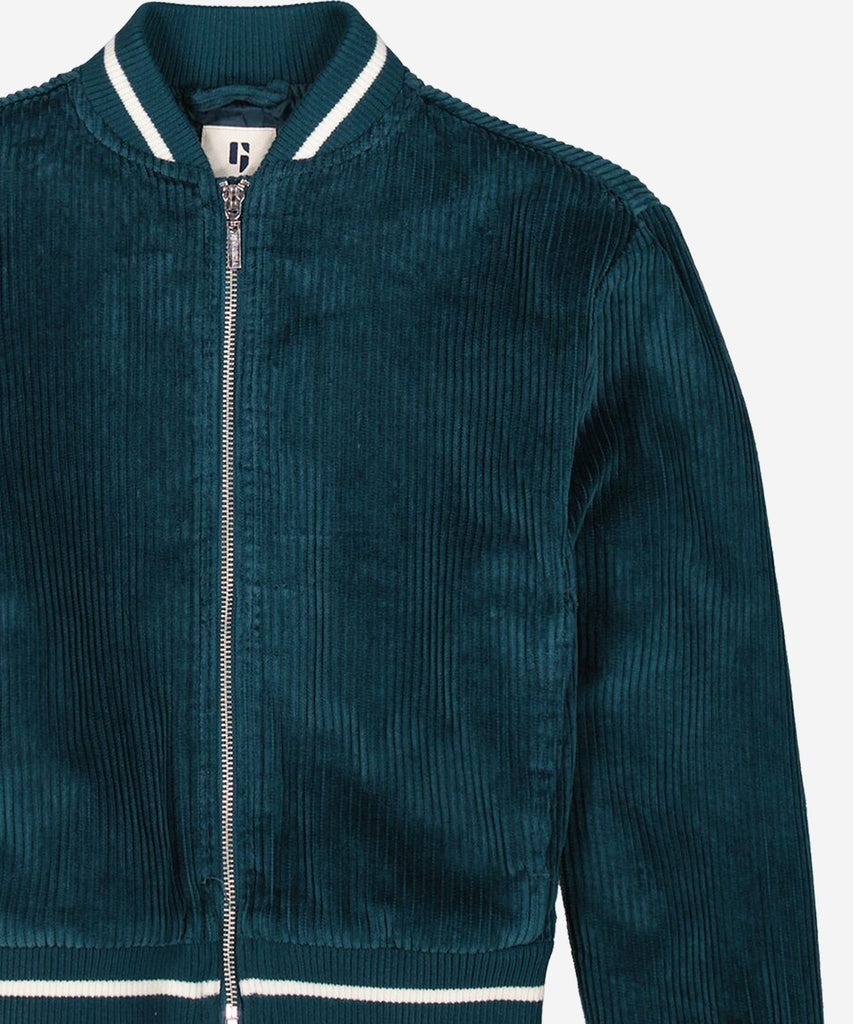 Details:&nbsp;Expertly crafted in royal petrol, this corduroy bomber cardigan jacket boasts a zip closure and practical pockets. Its timeless design seamlessly blends style and functionality, making it a must-have addition to any wardrobe. Stay warm and fashionable while staying on trend with this versatile piece.&nbsp;
Color: Petrol&nbsp;
Composition:&nbsp; 100% Cotton &nbsp;&nbsp;