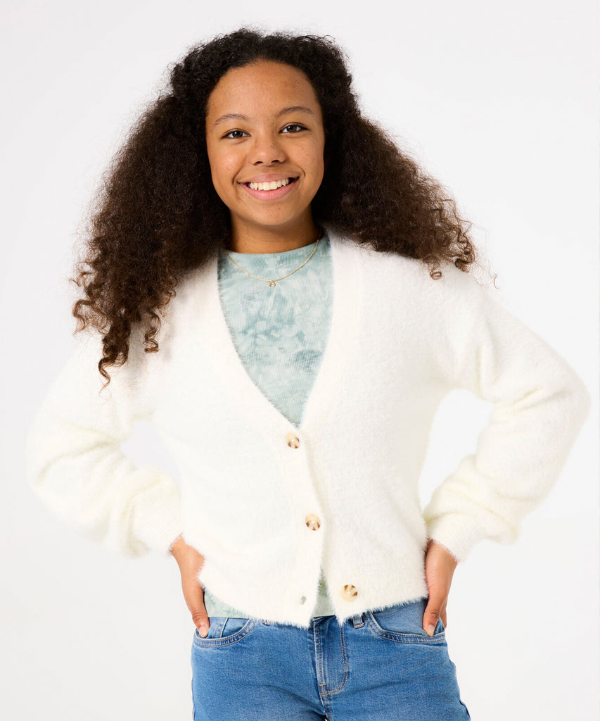 Details:&nbsp;Indulge in cozy comfort with our Soft Fluffy Knit Cardigan in Off White. Made from a luxurious fluffy knit material, this cardigan envelops you in warmth and softness. The button closure adds a touch of elegance, making it the perfect addition to any outfit.&nbsp;
Color: Off white&nbsp;&nbsp;
Composition:&nbsp; 54% Polyamide, 30% Viscose, 16% Polyester &nbsp;&nbsp;