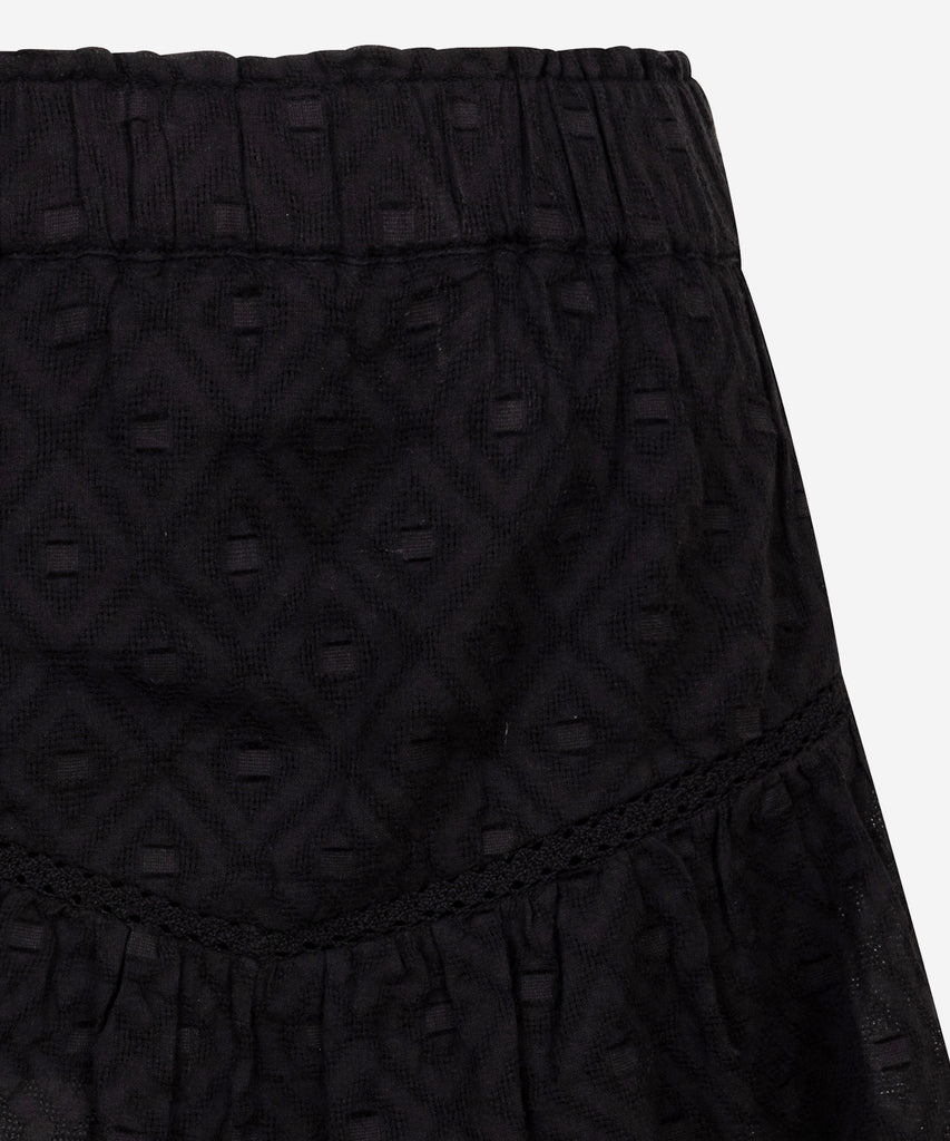 Details:&nbsp; Add a flirty touch to your wardrobe with our Lace Ruffle Skirt in a nice black&nbsp; color. The delicate lace ruffles and elastic waistband provide a comfortable yet stylish fit, while the built-in shorts offer convenience and coverage. Perfect for any occasion! &nbsp; Color: Black&nbsp; Composition:&nbsp; Woven Cotton 100% Cotton &nbsp; &nbsp;