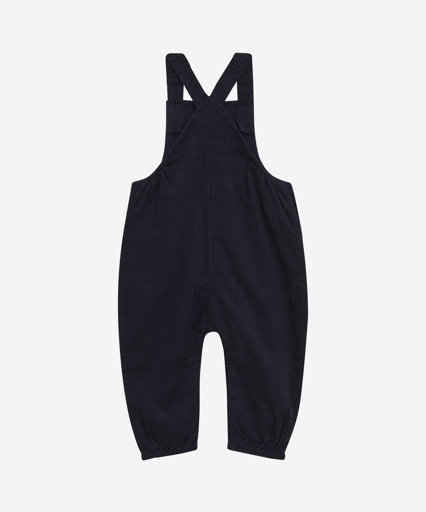 Details:&nbsp; Introducing our Baby Corduroy Overall in Night Blue - a stylish and durable choice for your little one. Made from soft corduroy, with a handy pocket and easy button closure, this overall provides both comfort and convenience. Perfect for any occasion and easy to clean.&nbsp; Color: Night blue&nbsp; Composition:&nbsp; Organic woven Corduroy 100% Cotton &nbsp;