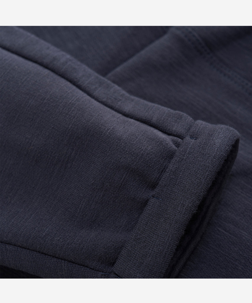 Details:&nbsp;These baby jogg pants are designed with comfort and style in mind. Soft and lightweight, each pair is equipped with an elastic waistband. Perfect for everyday wear.&nbsp; Color: Night blue&nbsp; Composition:&nbsp; Organic Sweat-slub Yarn 95% Cotton/ 5% Elastane &nbsp;