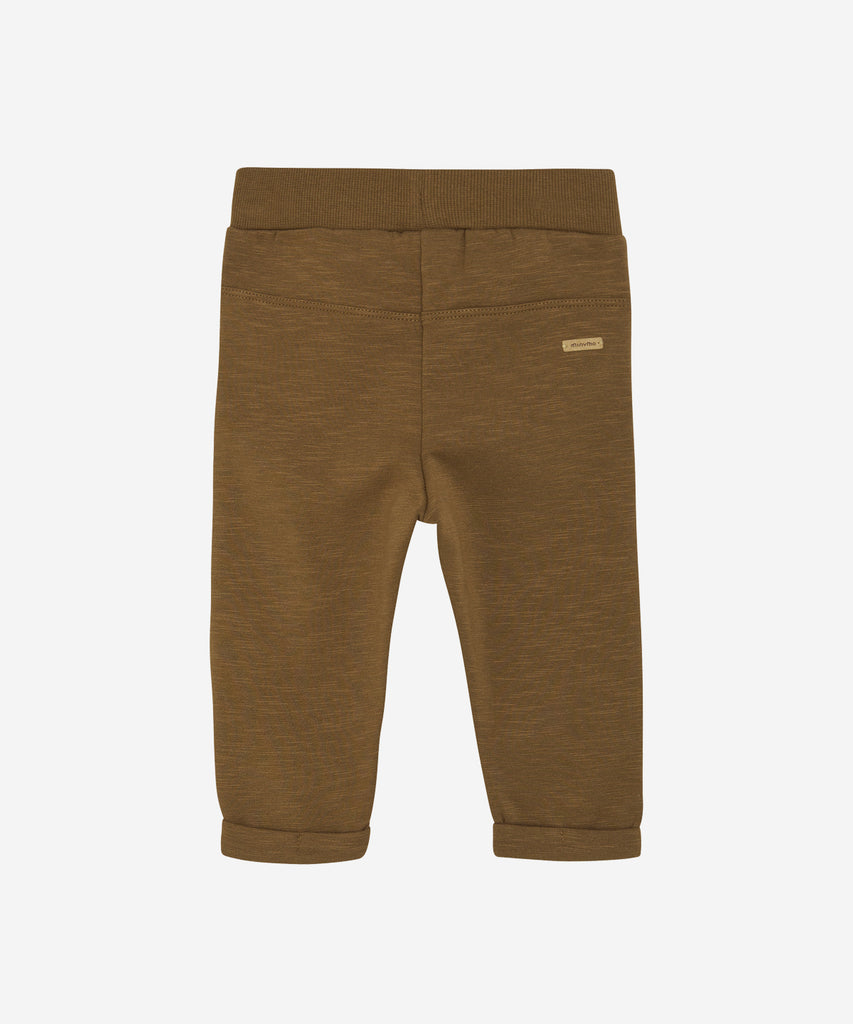 Details:&nbsp;These baby jogg pants are designed with comfort and style in mind. Soft and lightweight, each pair is equipped with an elastic waistband. Perfect for everyday wear.&nbsp; Color: Brown&nbsp; Composition:&nbsp; Organic Sweat-slub Yarn 95% Cotton/ 5% Elastane &nbsp;