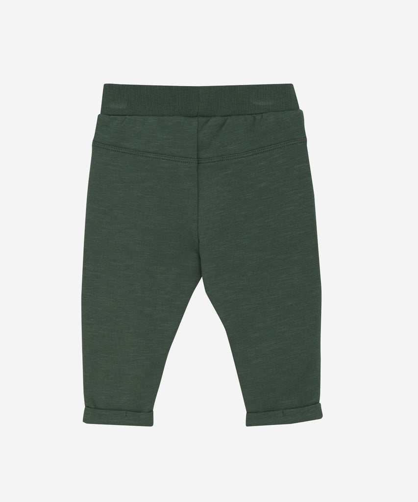 Details:&nbsp;These baby jogg pants are designed with comfort and style in mind. Soft and lightweight, each pair is equipped with an elastic waistband. Perfect for everyday wear.&nbsp;
Color: Jungle green&nbsp;
Composition:&nbsp; Organic Sweat-slub Yarn 95% Cotton/ 5% Elastane &nbsp;