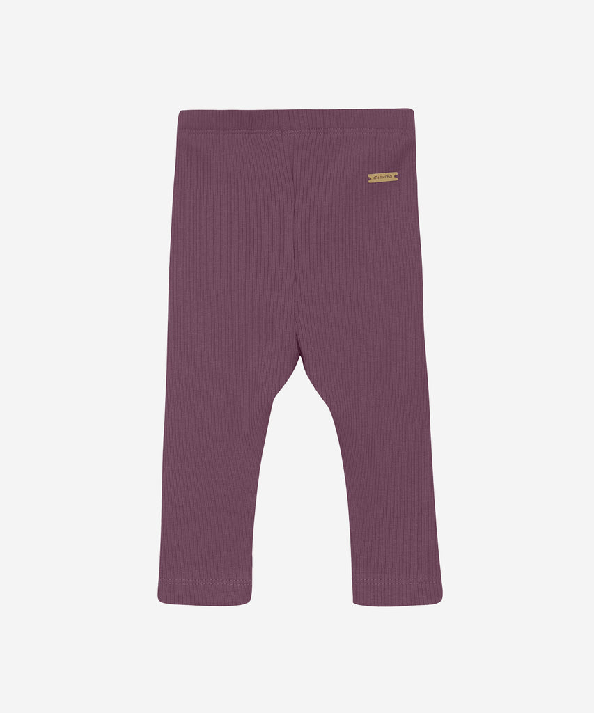 Details:&nbsp; These black plum baby rib leggings are the perfect addition to any little one's wardrobe. With a comfortable elastic waistband, these leggings are not only stylish but also practical. Made from high-quality rib fabric, they provide warmth and flexibility for your baby's needs. Color: Black plum&nbsp; Composition:&nbsp; 50% Modal/ 46% Cotton/ 4% Elastane &nbsp;