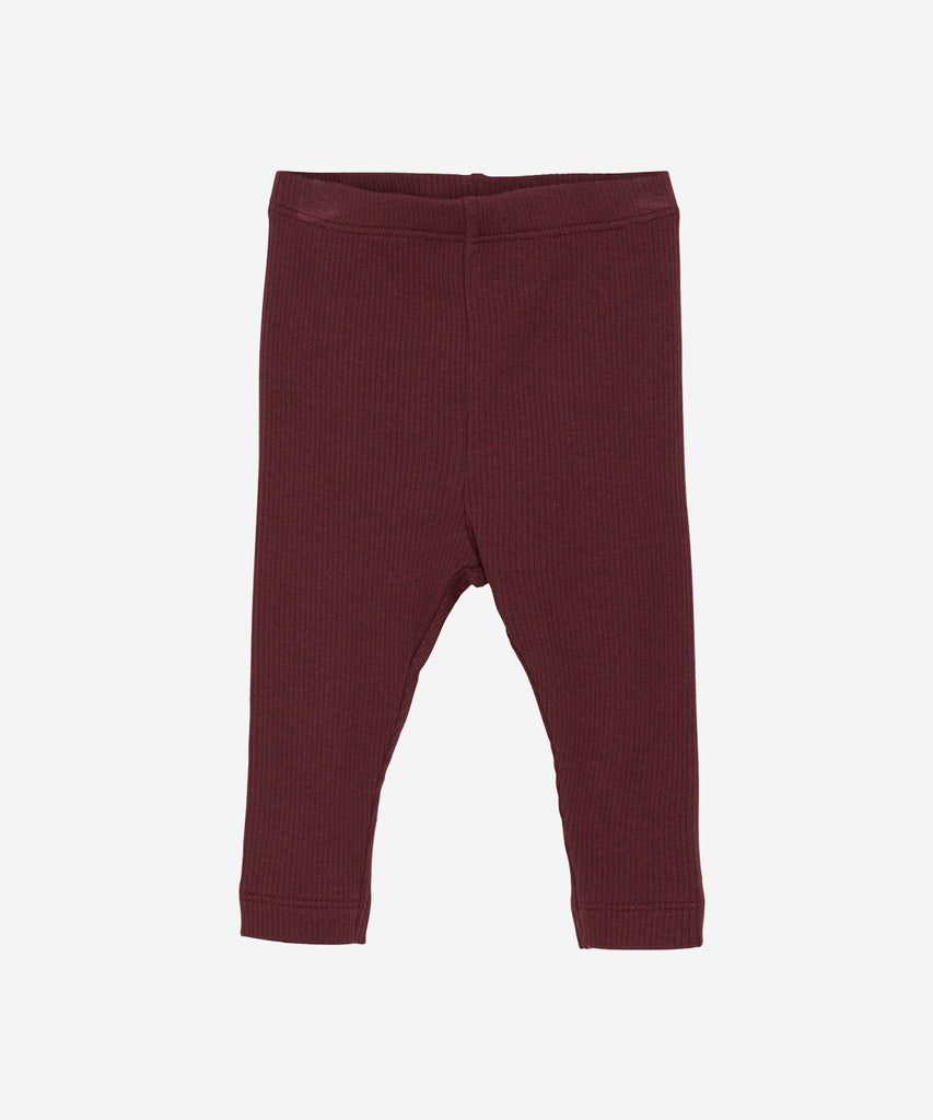 Details:&nbsp; These tawny port red baby rib leggings are the perfect addition to any little one's wardrobe. With a comfortable elastic waistband, these leggings are not only stylish but also practical. Made from high-quality rib fabric, they provide warmth and flexibility for your baby's needs.
Color: Tawny port red&nbsp;
Composition:&nbsp; 50% Modal/ 46% Cotton/ 4% Elastane &nbsp;