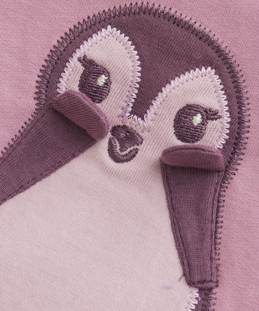 Details:&nbsp; This dawn pink baby sweater features an adorable Penguin design on the front, making it a charming addition to your little one's wardrobe. The round neckline and buttons on the back make it easy to dress your baby, while keeping them comfortable and cozy. Perfect for any occasion.&nbsp; Color: Dawn pink&nbsp; Composition:&nbsp; Organic Sweat Brushed 95% Cotton/ 5% Elastane &nbsp;