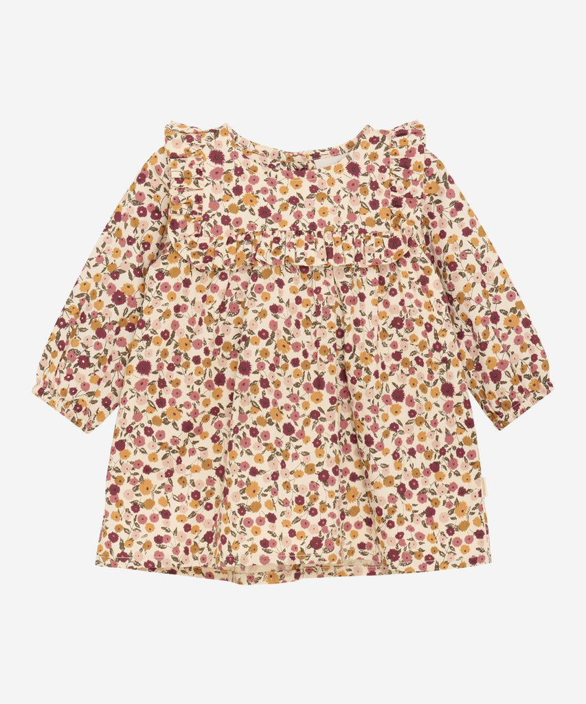 Details: &nbsp;This baby woven dress features a delicate all-over flower print and long sleeves for added warmth. The lightweight fabric is lined for extra comfort, making it perfect for your little one's special occasions. Elevate their wardrobe with this charming and stylish dress.&nbsp;
Color: Eggnog&nbsp;
Composition:&nbsp;100% Cotton&nbsp;