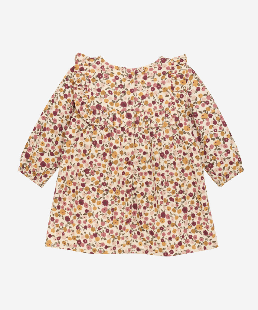 Details: &nbsp;This baby woven dress features a delicate all-over flower print and long sleeves for added warmth. The lightweight fabric is lined for extra comfort, making it perfect for your little one's special occasions. Elevate their wardrobe with this charming and stylish dress.&nbsp;
Color: Eggnog&nbsp;
Composition:&nbsp;100% Cotton&nbsp;