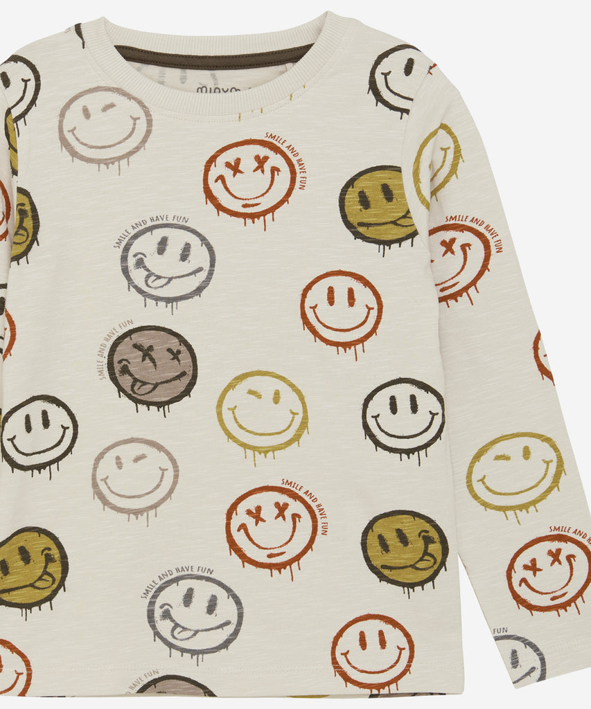 Details:&nbsp; Expertly designed for comfort and style, our LS T-Shirt AOP Smileys Moonbeam is the perfect addition to your wardrobe. With a round neckline and all-over print of cheerful smileys, this long-sleeve shirt is sure to make you smile every time you wear it.&nbsp;Perfect for any casual occasion.&nbsp; Color: Moonbeam&nbsp; Composition:&nbsp; Organic Sweat-slub Yarn 95% Cotton/ 5% Elastan