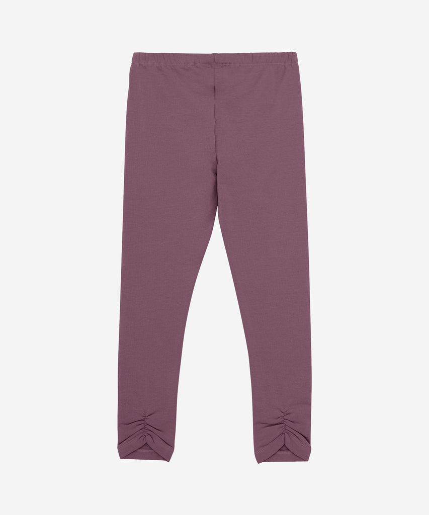 Details: &nbsp;Expertly crafted in soft, breathable fabric, these sweat leggings in black plum with unique detailing offer maximum comfort and style. The elastic waistband ensures a secure fit, while the effortlessly chic color adds a touch of sophistication to any workout. Experience the perfect blend of fashion and functionality.&nbsp; Color: Black plum&nbsp; Composition:&nbsp; Organic Sweat Brushed 95% Cotton/ 5% Elastane&nbsp;