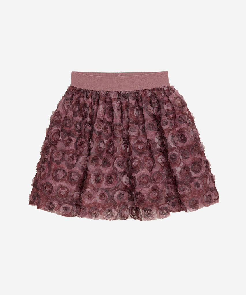 Details: &nbsp;This tulle skirt features elegant mesh flowers in a deco rose color and an elastic waistband for a comfortable fit. Add a touch of romance and femininity to any outfit with this beautiful skirt. Perfect for special occasions or everyday wear. &nbsp;
Color: Deco rose&nbsp;
Composition:&nbsp;100% Polyester&nbsp;
