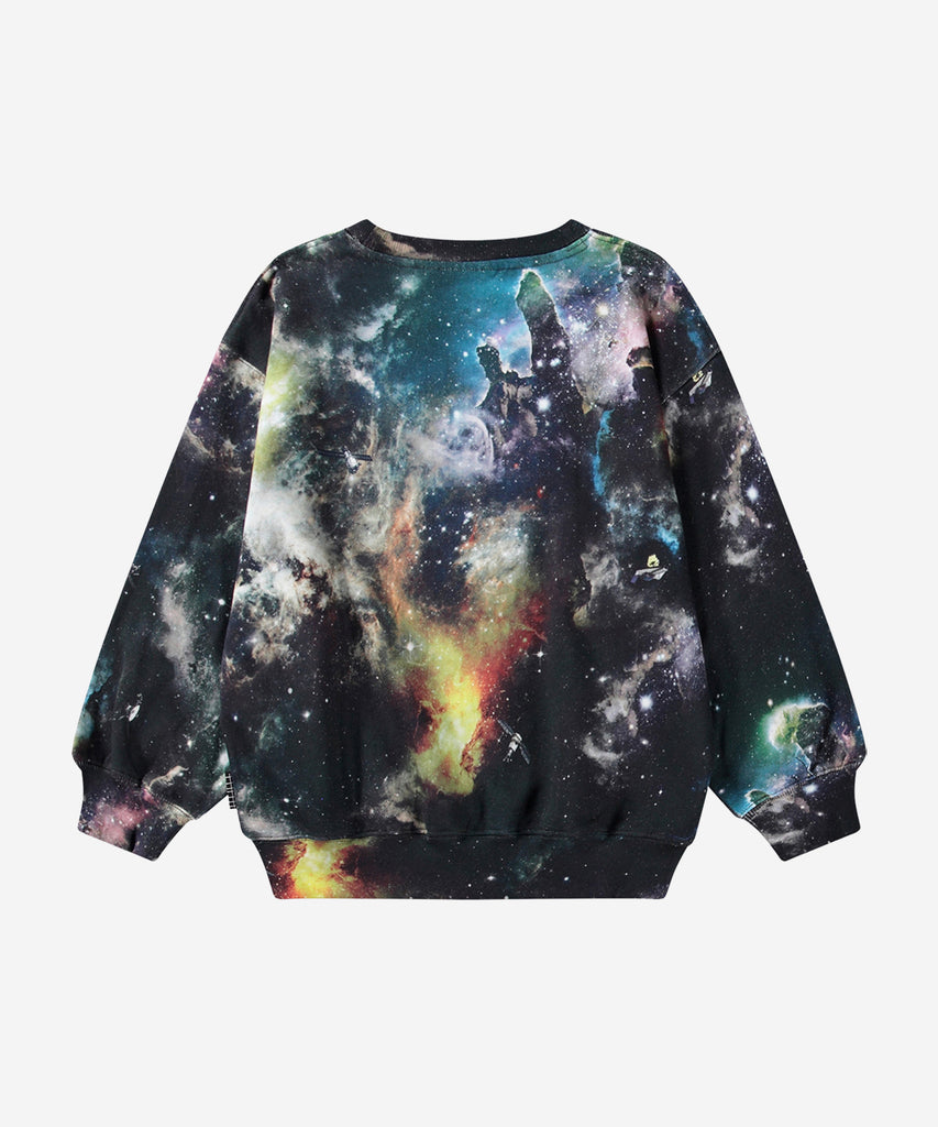 Details: Multicoloured sweatshirt in organic cotton with a brushed inner face, making it soft and warm to wear. The sweatshirt has a loose fit, round neckline, and rib cuffs and hem. The all-over print is inspired by an image from the James Webb Space Telescope and depicts outer space. If you look closely, you might spot some floating satellites.
This Molo product is GOTS Organic certified by Ecocert Greenlife, License no. 197496.&nbsp;
Colour: Multi color&nbsp;
Composition:&nbsp;100% organic cotton &nbsp;