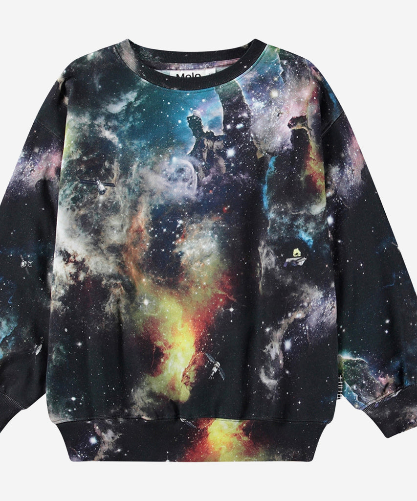 Details: Multicoloured sweatshirt in organic cotton with a brushed inner face, making it soft and warm to wear. The sweatshirt has a loose fit, round neckline, and rib cuffs and hem. The all-over print is inspired by an image from the James Webb Space Telescope and depicts outer space. If you look closely, you might spot some floating satellites.
This Molo product is GOTS Organic certified by Ecocert Greenlife, License no. 197496.&nbsp;
Colour: Multi color&nbsp;
Composition:&nbsp;100% organic cotton &nbsp;