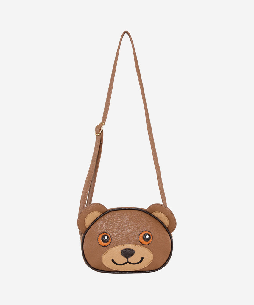 Details:&nbsp; Our Teddy Bear Cross Body bag is the perfect companion for any adventure! This bag features an adorable Teddy Bear design and zip closure to make sure your items are safe and secure. With this stylish bag, you're sure to be a hit no matter where your day takes you!&nbsp; Color: Brown&nbsp; Composition:&nbsp; 100% Polyurethane&nbsp;