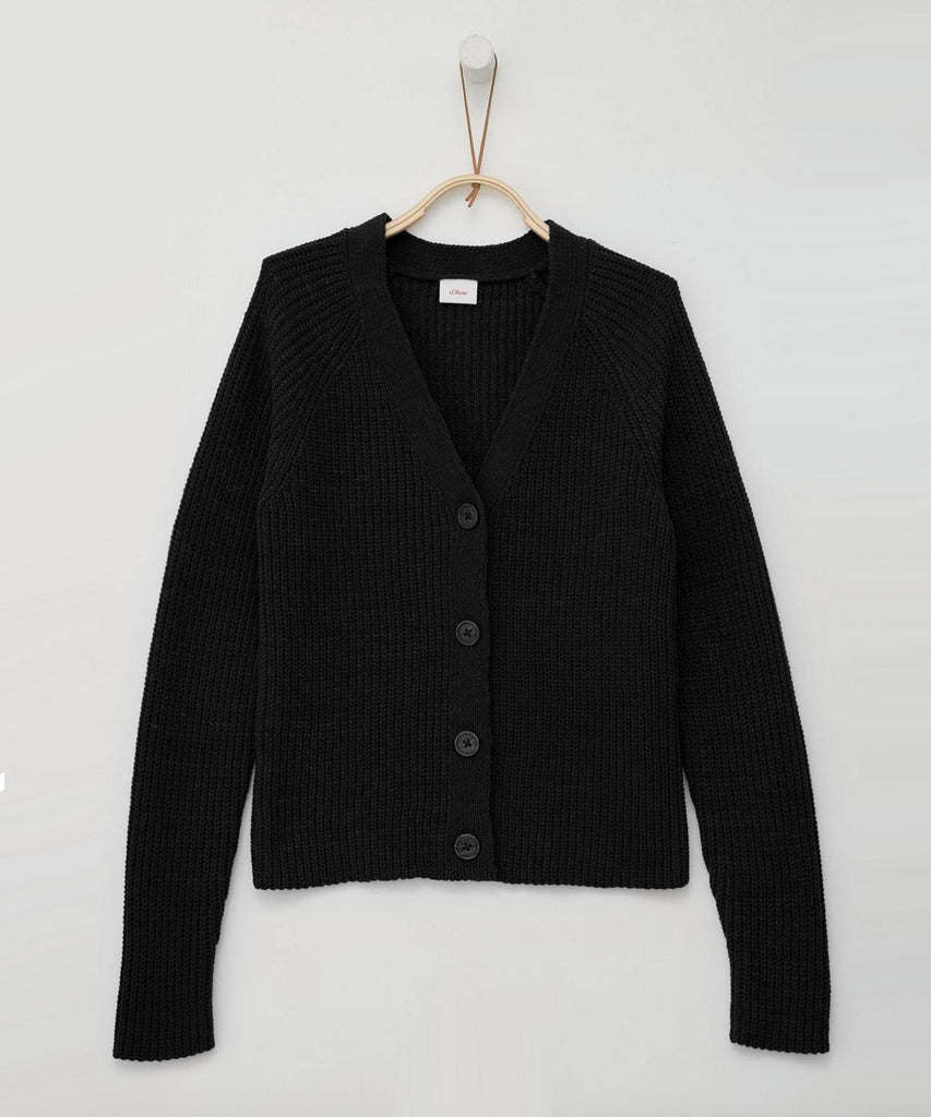 Details:&nbsp;This black button cardigan is made from a soft, knitted rib material, providing both comfort and style. Perfect for layering on colder days or dressing up for a night out. The ribbed texture adds a touch of sophistication while the buttons offer a classic touch. A versatile addition to any wardrobe.&nbsp;
Color: Black&nbsp;
Composition:&nbsp; Winter'24 &nbsp;