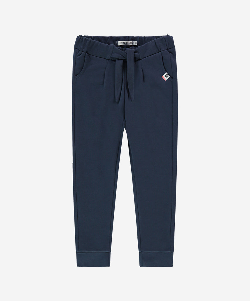 Details: &nbsp;Expertly crafted for comfort and style, our Jogg Pants Knot Indigo offer the perfect blend of function and fashion. The elastic waistband provides a secure fit, while the unique knot detail adds a touch of uniqueness to these versatile jogging pants. Upgrade your athleisure game with our Indigo Jogg Pants.&nbsp;
Color: Indigo&nbsp;
Composition: Winter'24 &nbsp;