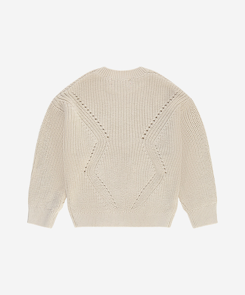 Details: This knit rib pullover in stone white offers a classic and versatile addition to your wardrobe. The round neckline and soft, comfortable fabric make it a perfect choice for any occasion. Elevate your style with a timeless and elegant look.&nbsp;&nbsp;
Color: Stone&nbsp;&nbsp;
Composition: 100% cotton&nbsp;